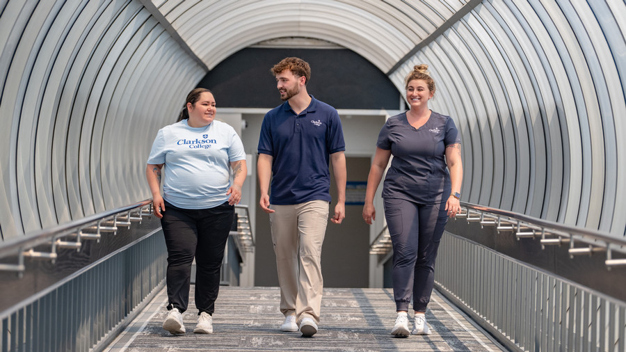 Students walking through the tunnel.